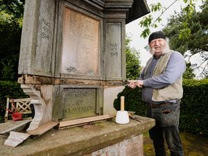 Alan Lamb from Swan Farm Studios in Ironbridge undertaking restoration work on a war memorial in Chyknell Hall 