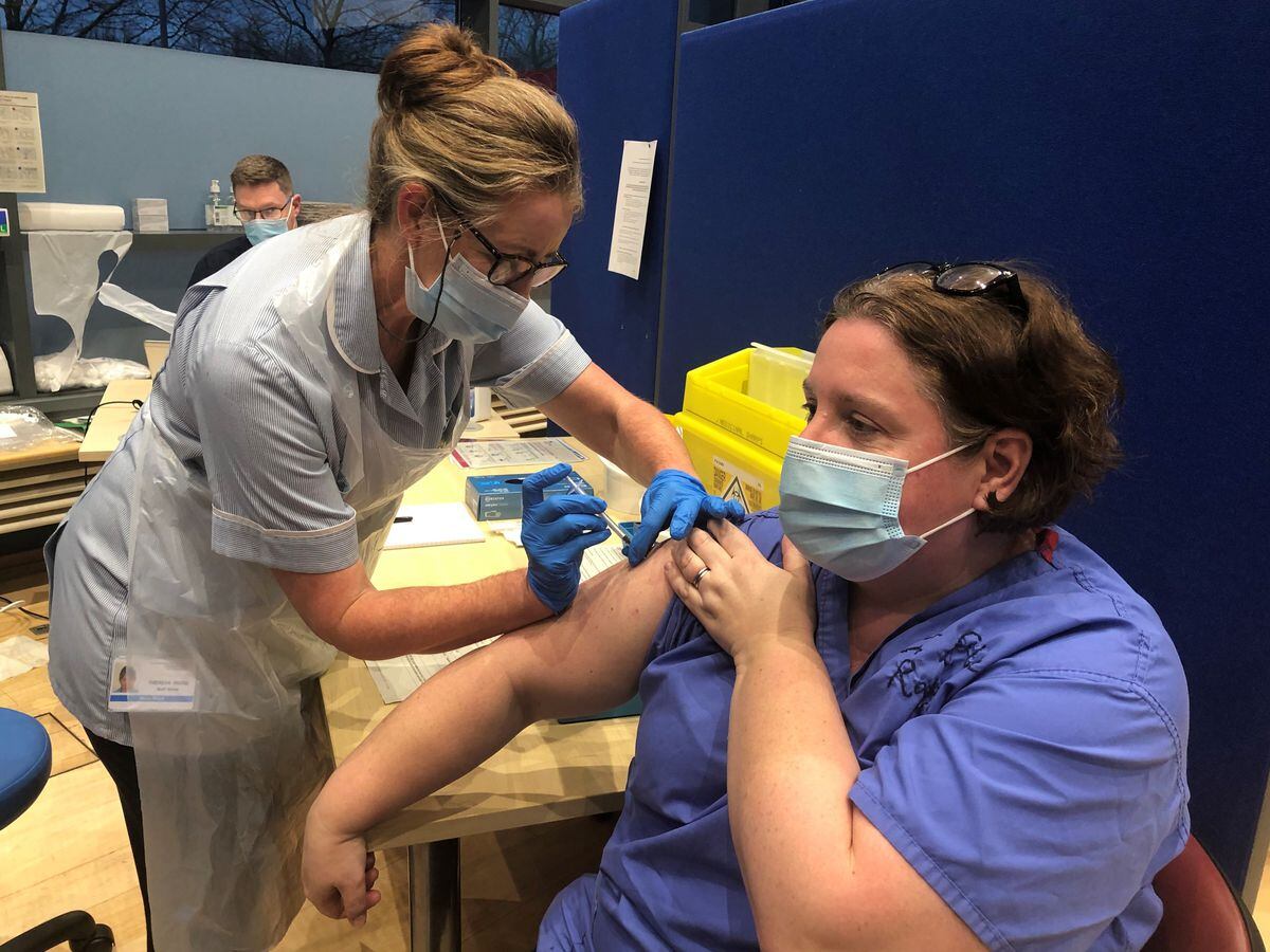 Dr Elin Roddy, a consultant respiratory physician, getting her jab