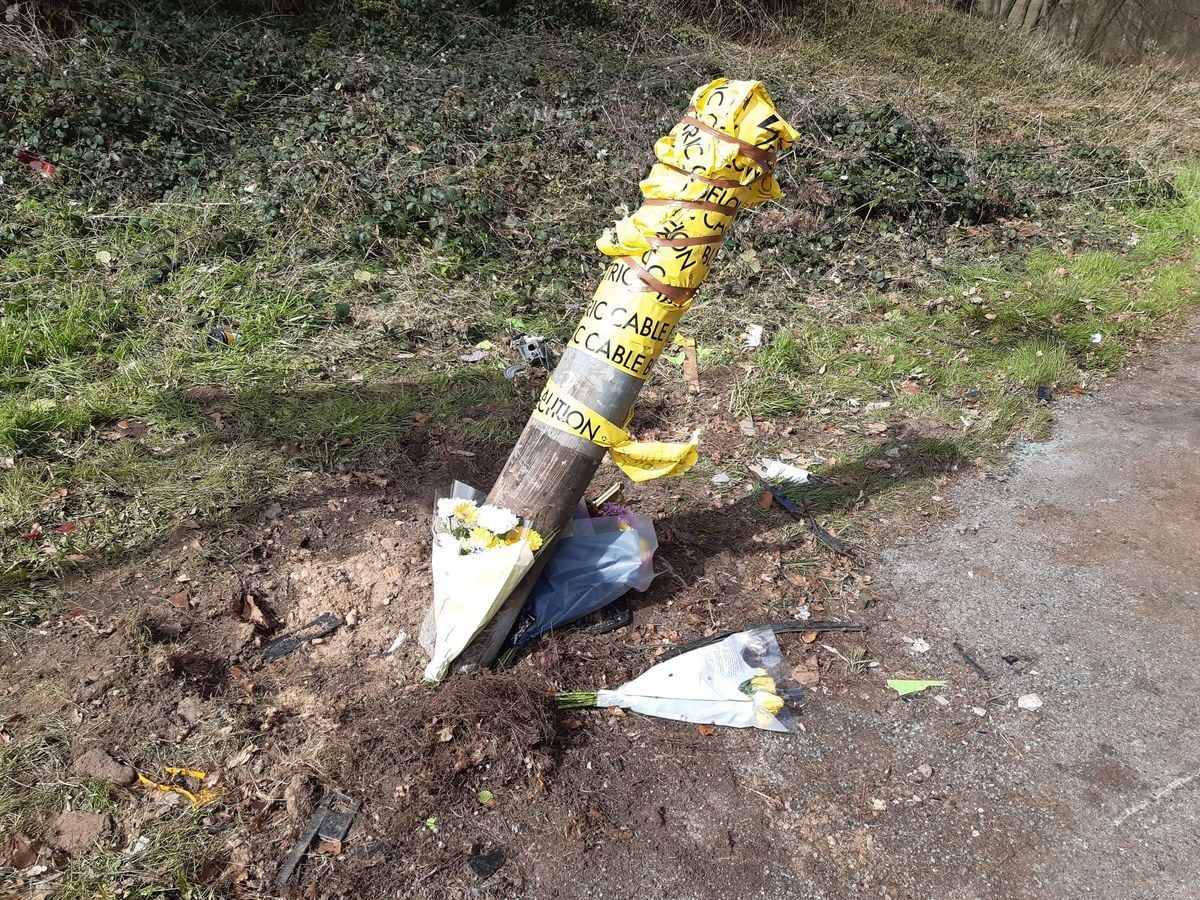 Flowers were left at the scene where the car crashed into the lamppost