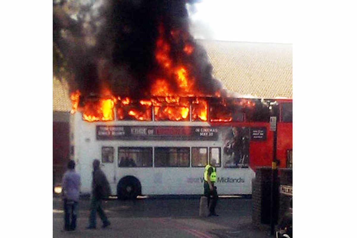 Bus bursts into flames