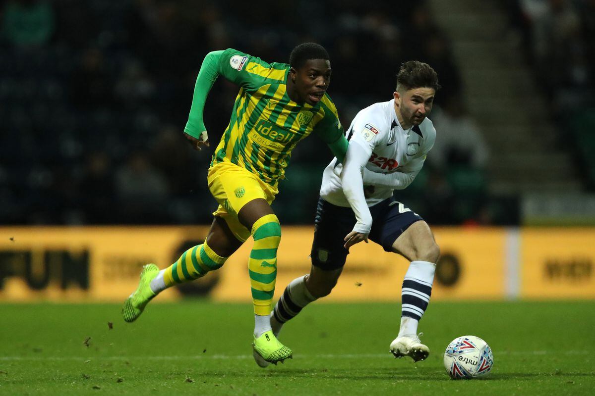 Nathan Ferguson of West Bromwich Albion and Sean Maguire of Preston North End. (AMA)