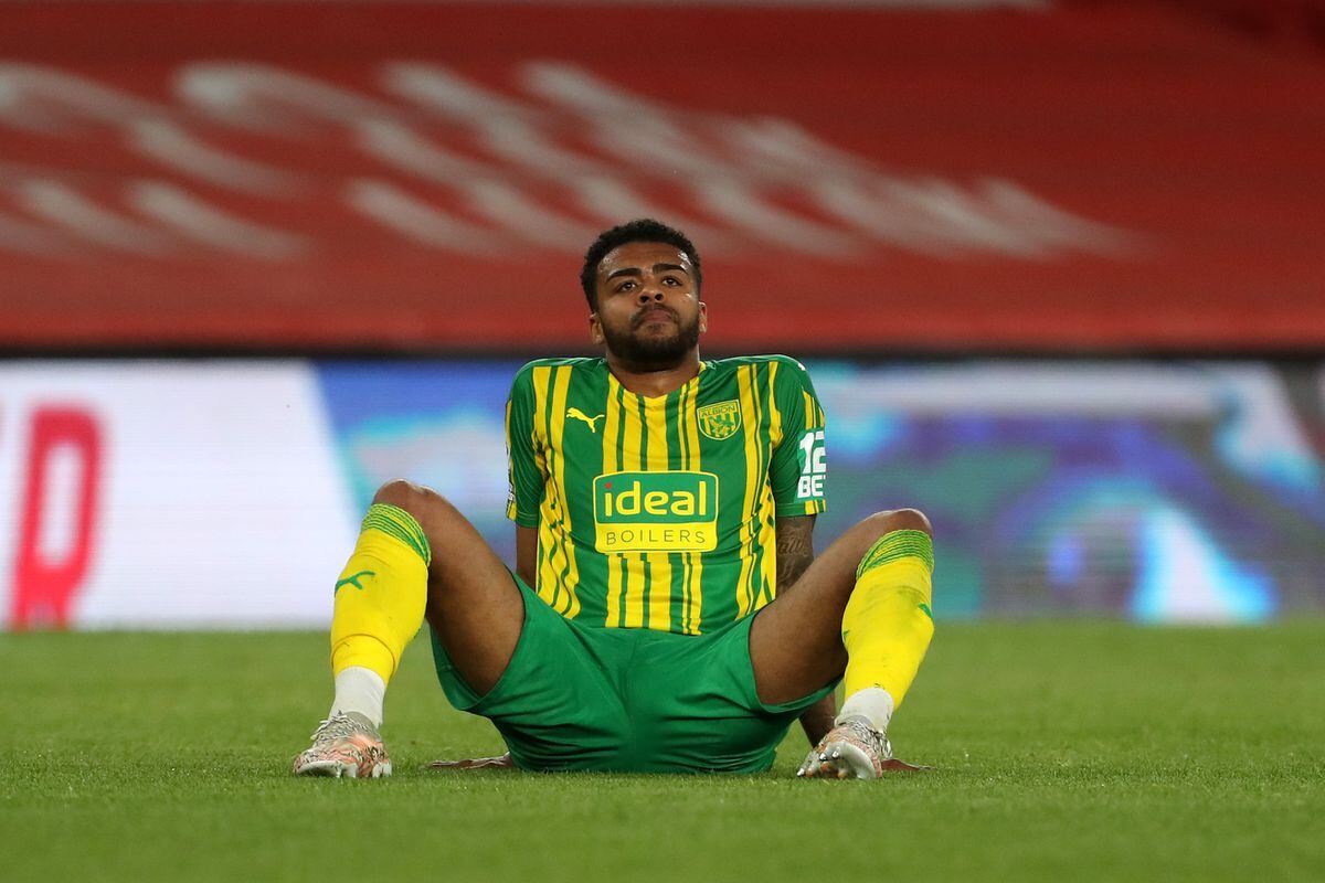 A dejected Darnell Furlong of West Bromwich Albion reacts at the final whistle having lost 3-1 meaning that West Bromwich Albion are relegated from the Premier League. (AMA)