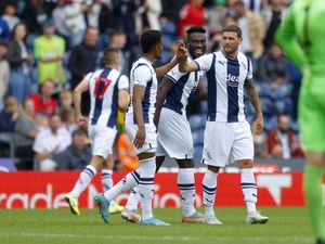 Daryl Dike of West Bromwich Albion celebrates scoring a goal with Grady Diangana and John Swift during the pre-season friendly between West Bromwich Albion and Hertha Berlin at The Hawthorns on July 23. Photo: Malcolm Couzens - WBA/West Bromwich Albion FC via Getty Images
