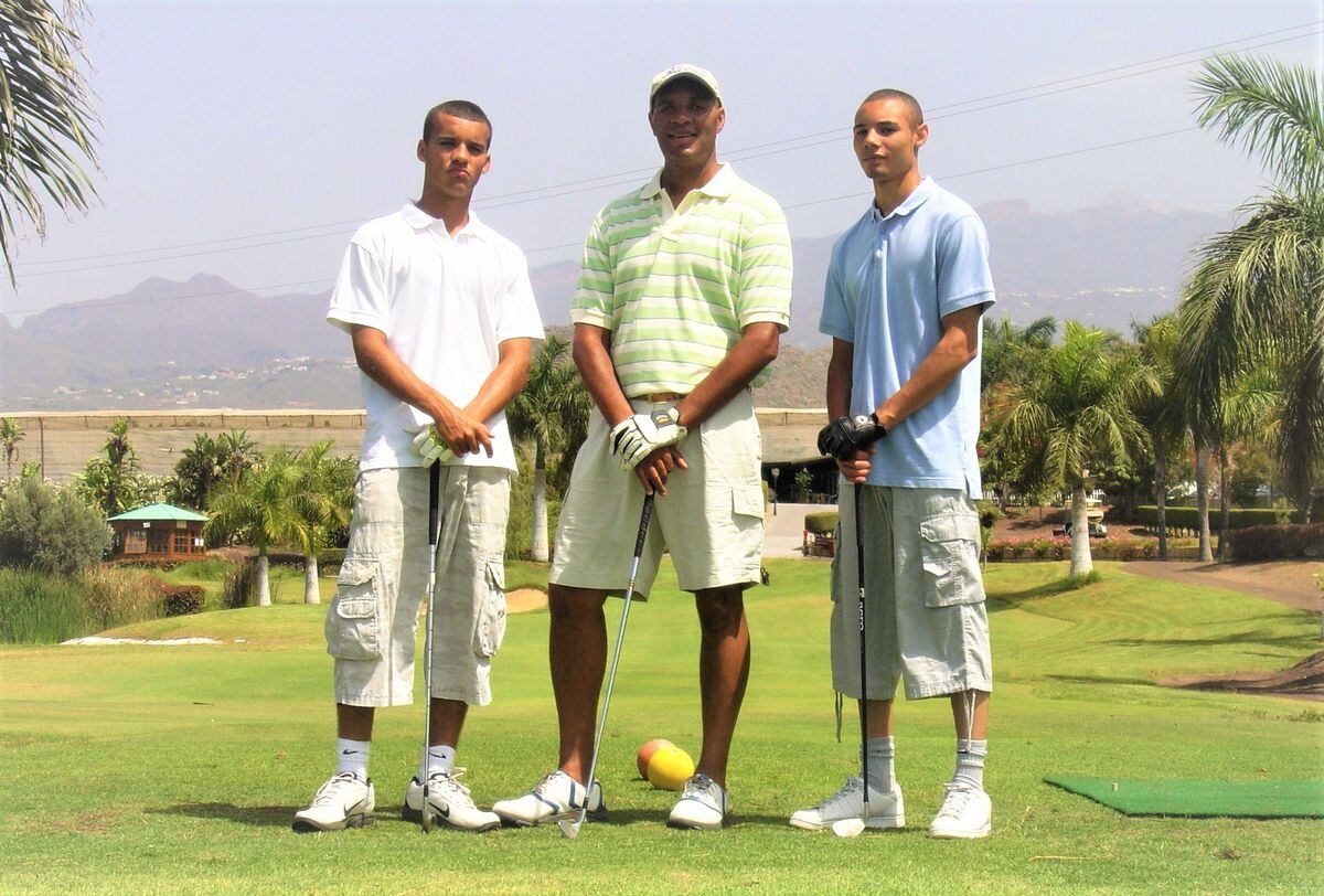 Ashley (Mike's son), Mike, and Mike's nephew playing golf in Tenerife