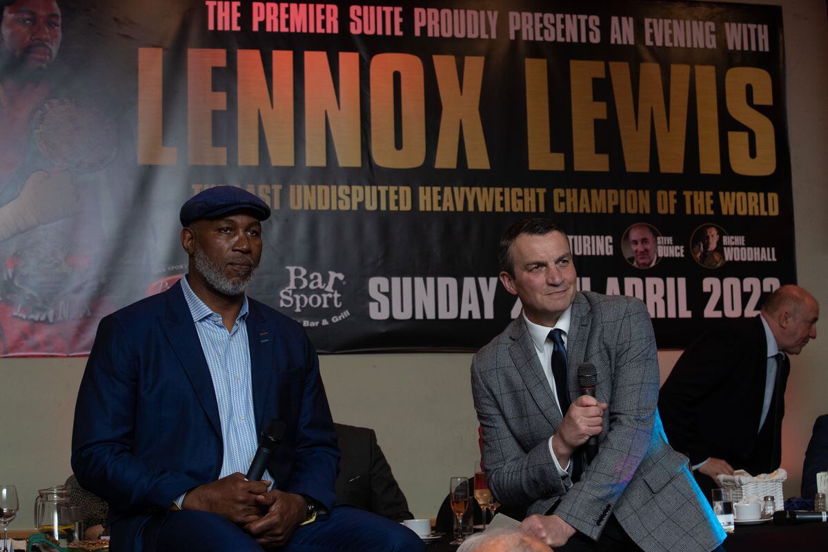 Lennox Lewis fields questions from Richie Woodhall during the event