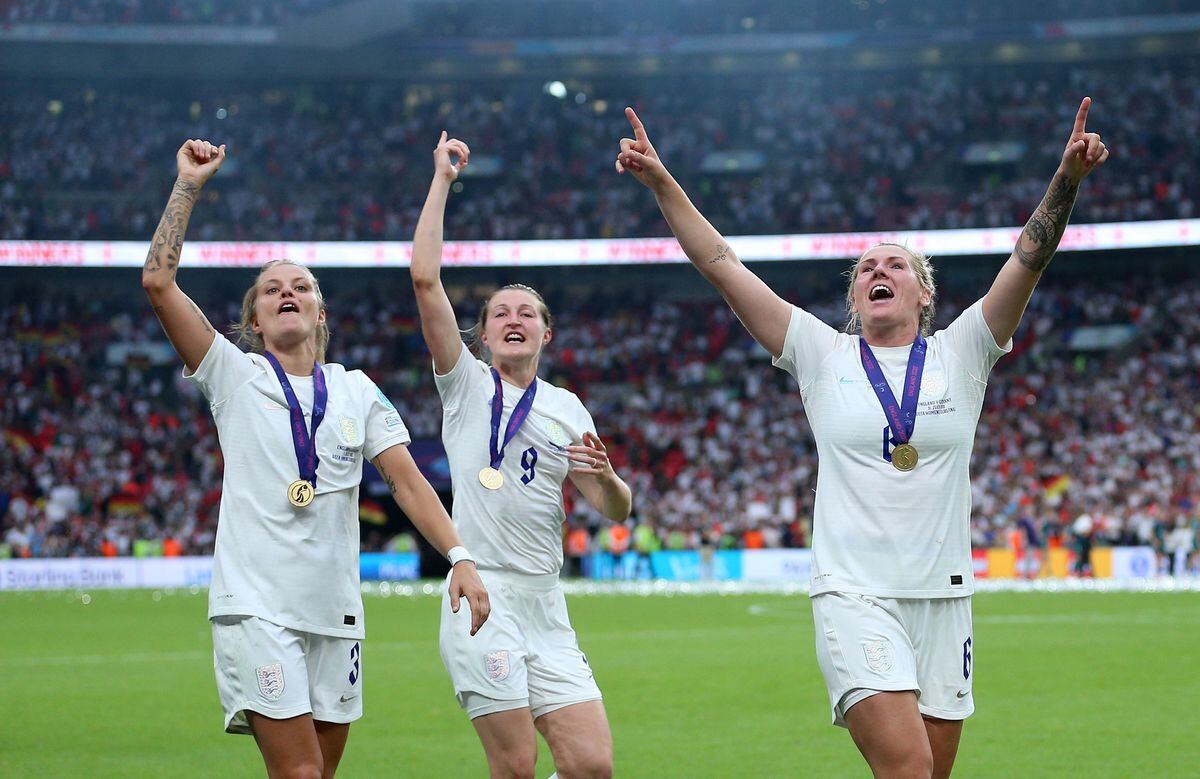 England's Rachel Daly, Ellen White and Millie Bright celebrate winning the UEFA Women's Euro 2022 final 