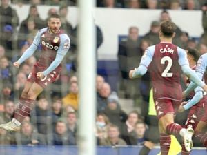 Aston Villa's Emiliano Buendia, left, celebrates after scoring his side's first goal