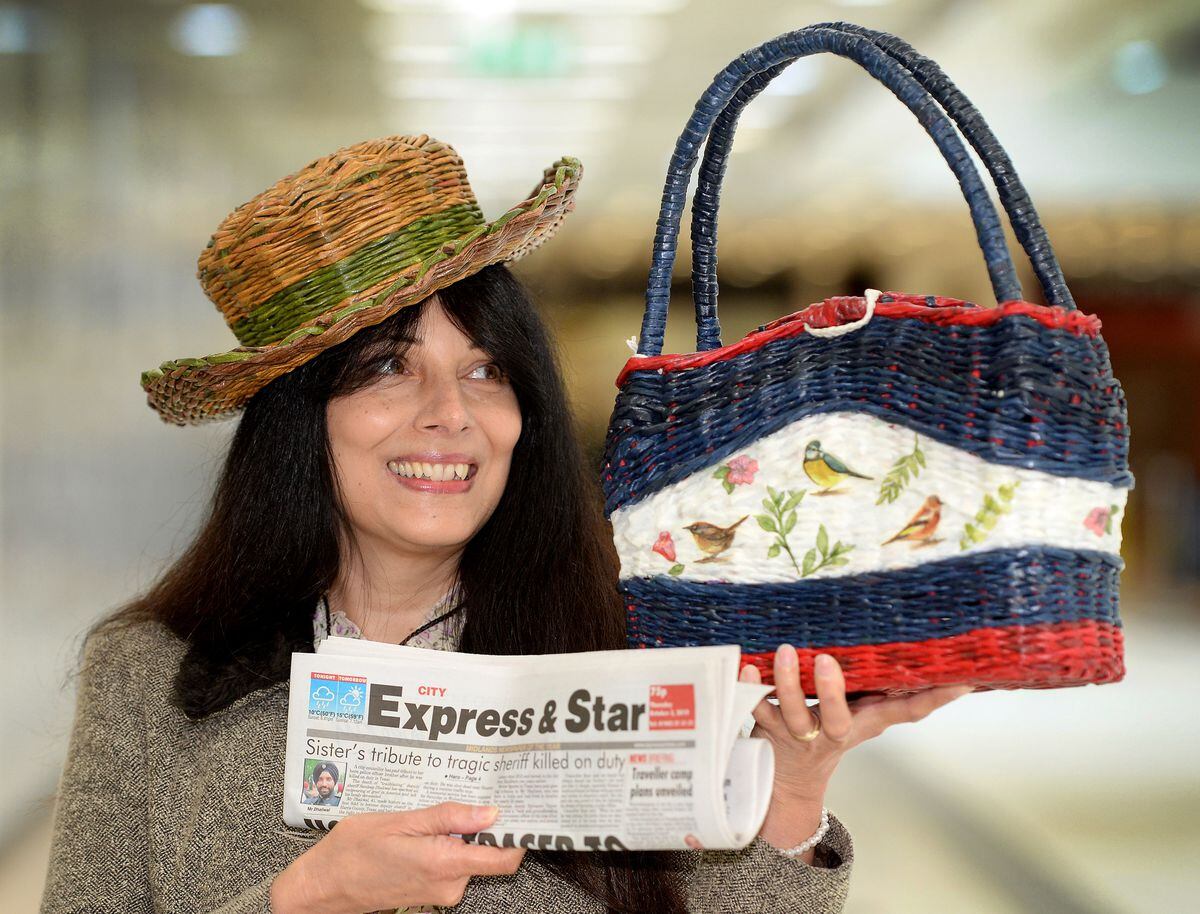 Valerie Morgan, who weaves bags and other items out of old Express & Star newspapers, including her hat