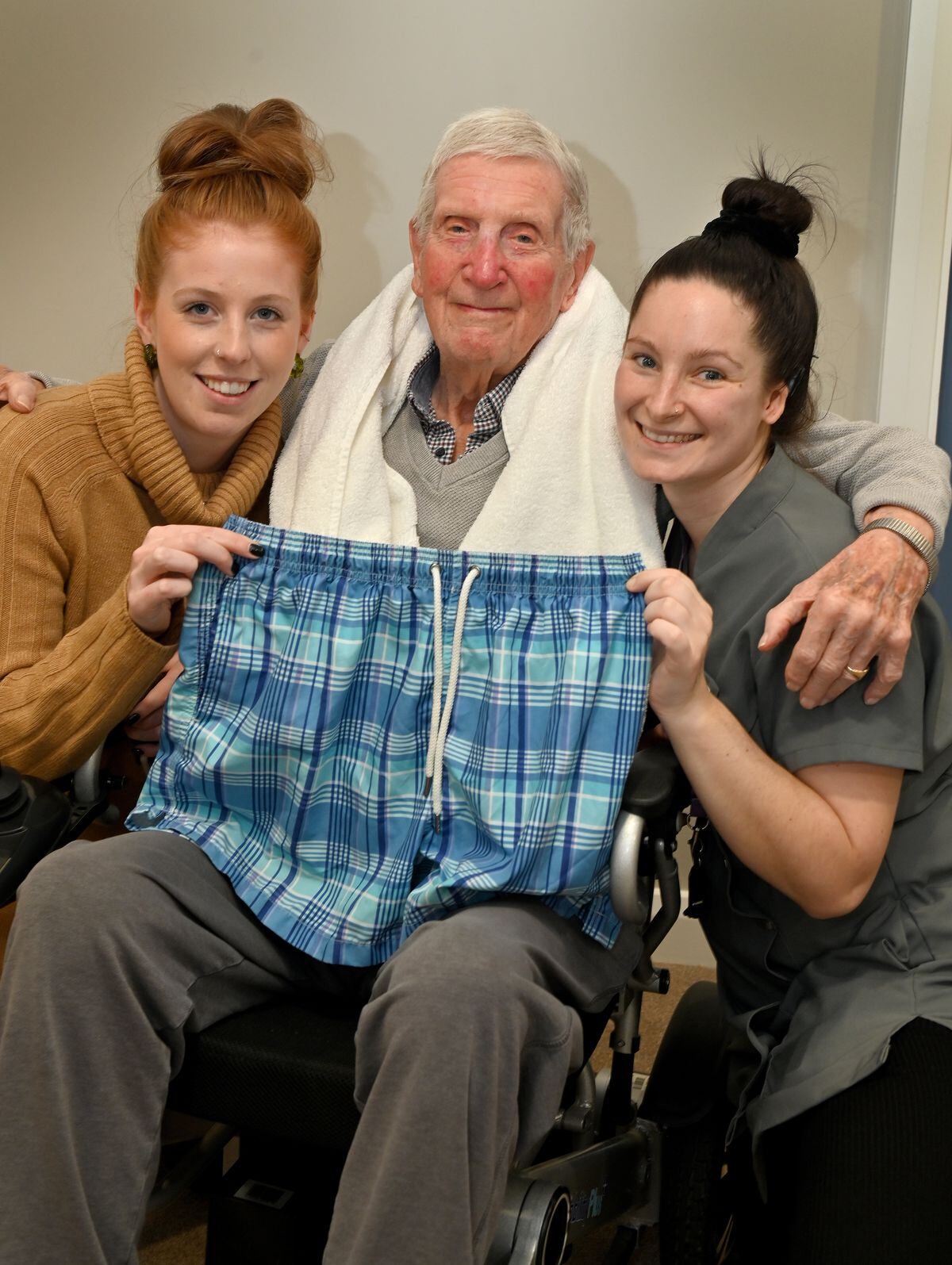 Roger Roberts with home manager Hannah Atkinson and care assistant Holli Whitehouse