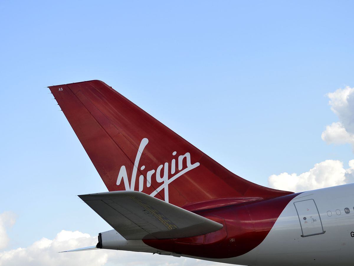Virgin plane turns back