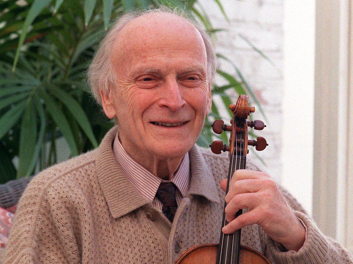 Violinist and conductor Yehudi Menuhin, pictured at his London home
