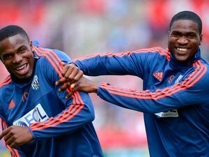 Victor Anichebe of West Bromwich Albion & Brown Ideye of West Bromwich Albion.