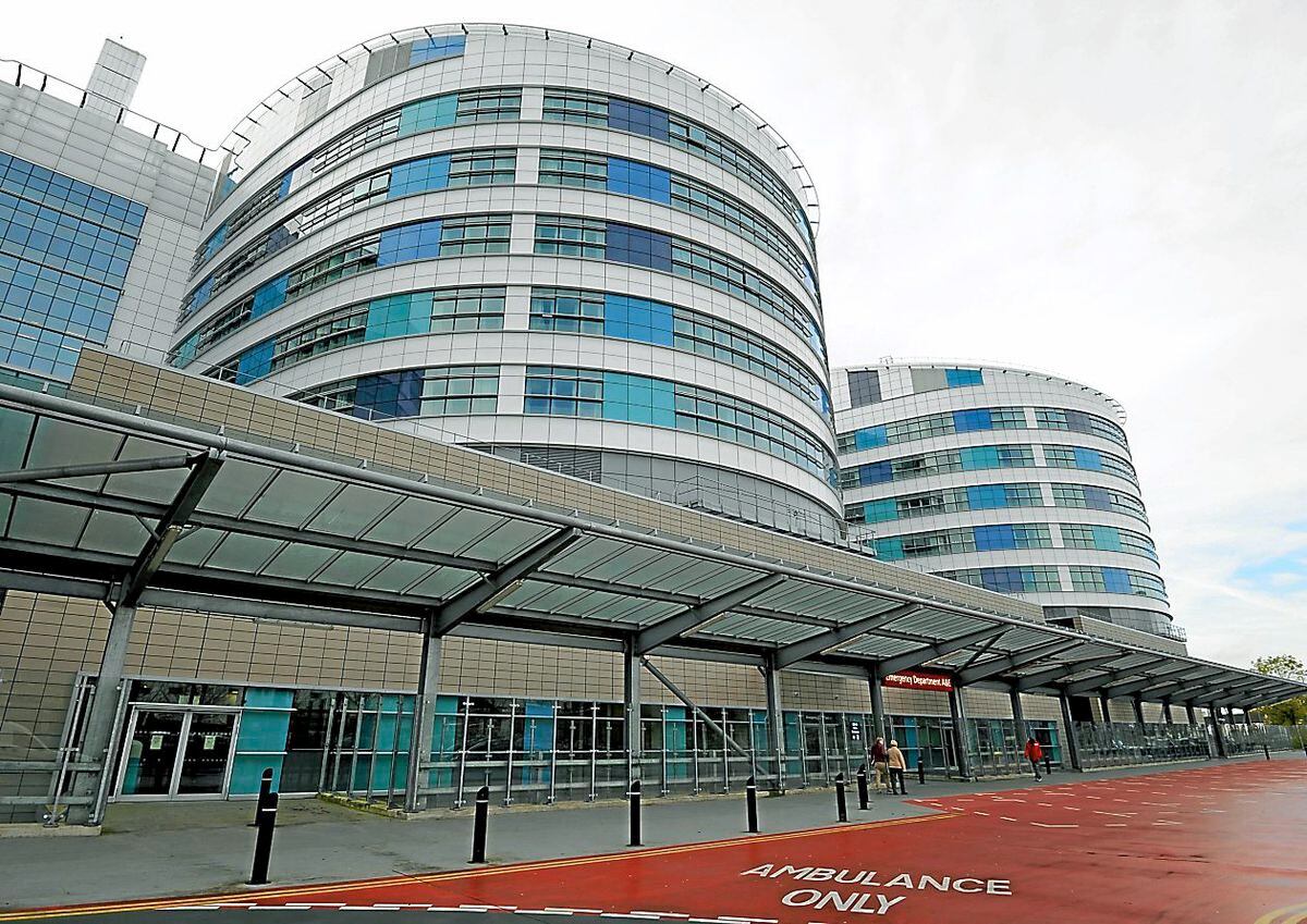 The health trust that runs Queen Elizabeth Hospital, pictured, has had the most Covid-19 deaths of any NHS trust in the UK