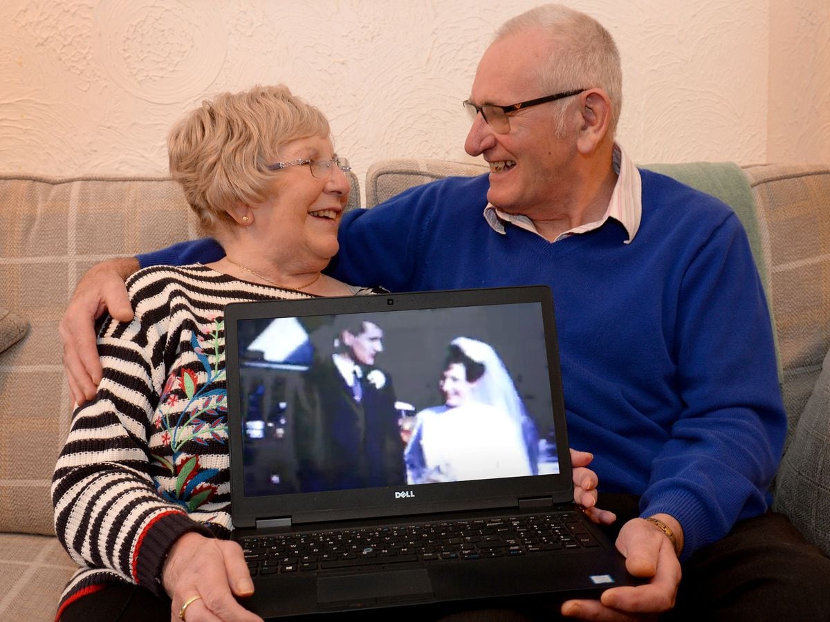 Margaret and Brian Hill with footage of their wedding day they have seen for the first time