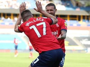 HUDDERSFIELD, ENGLAND - AUGUST 27: Jed Wallace of West Bromwich Albion celebrates after scoring a goal to make it 2-2 with John Swift of West Bromwich Albion during the Sky Bet Championship between Huddersfield Town and West Bromwich Albion at John Smith's Stadium on August 27, 2022 in Huddersfield, United Kingdom. (Photo by Adam Fradgley/West Bromwich Albion FC via Getty Images).