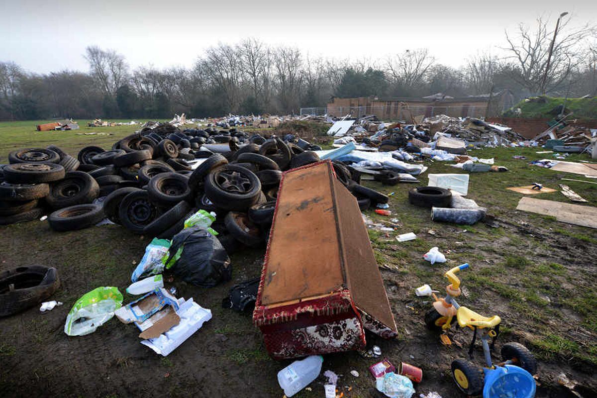 Huge rubbish pile left after travellers' camp moved off Smethwick park - WATCH