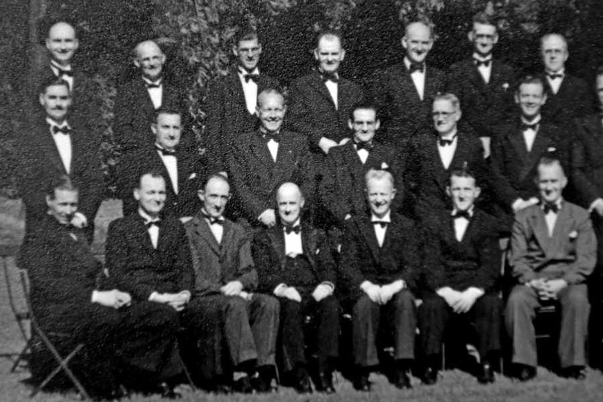 Bill, third from left in the back row, with the choir in the 1950s