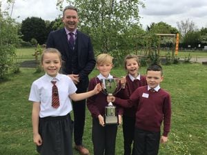 Chris King, Severn Academies Educational Trust chief executive with St Bartholomew’s winning team, from left, Ava Wilkes, Harry Furnival, Jasmine Ashdown and Archie May