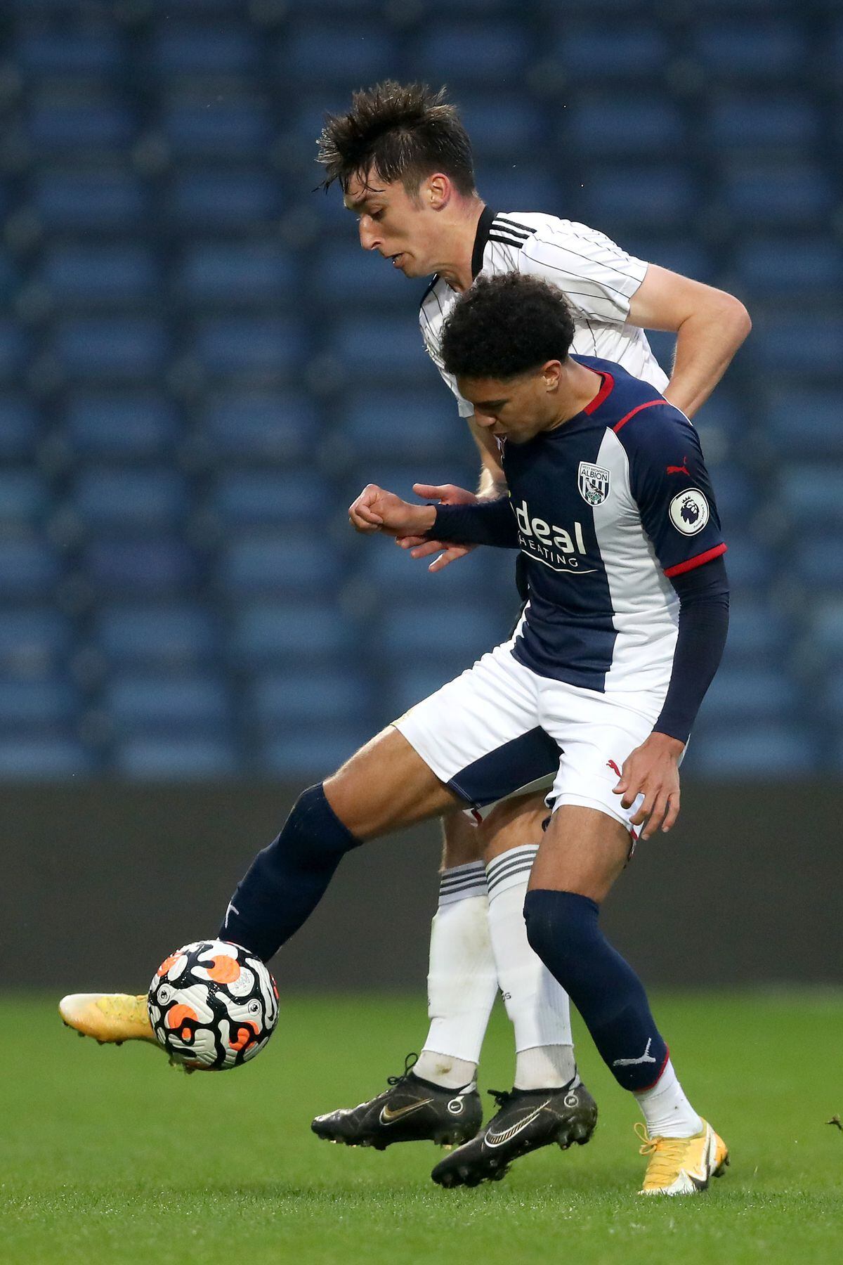 Kieron Bowie of Fulham and Ethan Ingram of West Bromwich Albion during the Premier League Cup / PL Cup at The Hawthorns on May 3, 2022 in West Bromwich, England. (Photo by Adam Fradgley/West Bromwich Albion FC via Getty Images)...