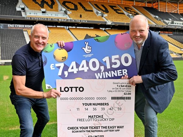 Wolves legend Steve Bull with Andy Cater, of the National Lottery 