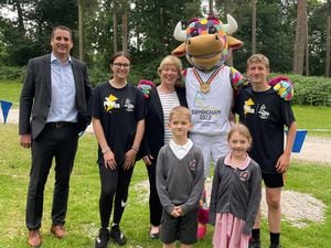 Chris Derbyshire (Inspiring Healthy Lifestyles), Ella (The Hart School), Councillor Adrienne Fitzgerald, Perry the Bull, Frazer (The Hart School) and Antony and Ruby from Year 2 at St Joseph’s Primary School in Hednesford enjoy the festival