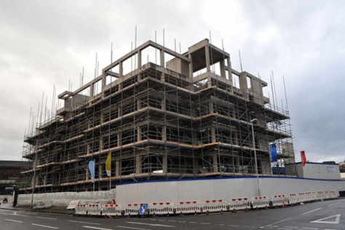 Builders back to finish city concrete skeleton