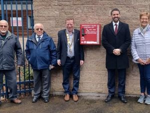 Left to right, Rotarians Peter Williams, Michael Scordis and Diane and Simon Sims join Willenhall Rotary Club president Simon Rollason and assistant West Midlands PCC Tom McNeil, centre, for the installation of the bleed kit at Willenhall Memorial Park