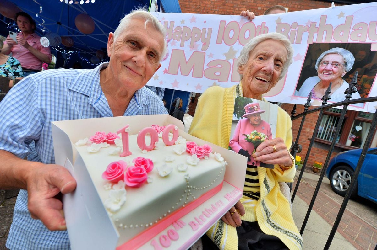 Kathleen-Mary Colbourne celebrating her 100th birthday – with son John Colbourne