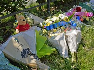 Among the tributes left at the scene was a Winnie the Pooh doll