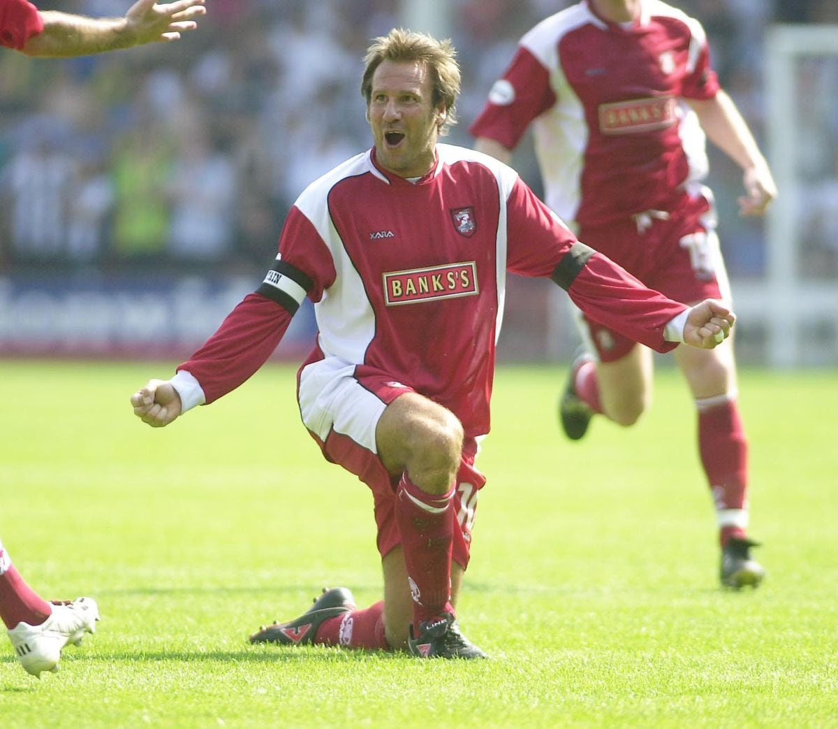 Paul Merson celebrates his goal as Walsall mauled Albion back on the opening day in 2003