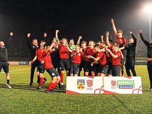 Burntwood Dragons Under-16s celebrate their County Cup win over FC Hanley Academy