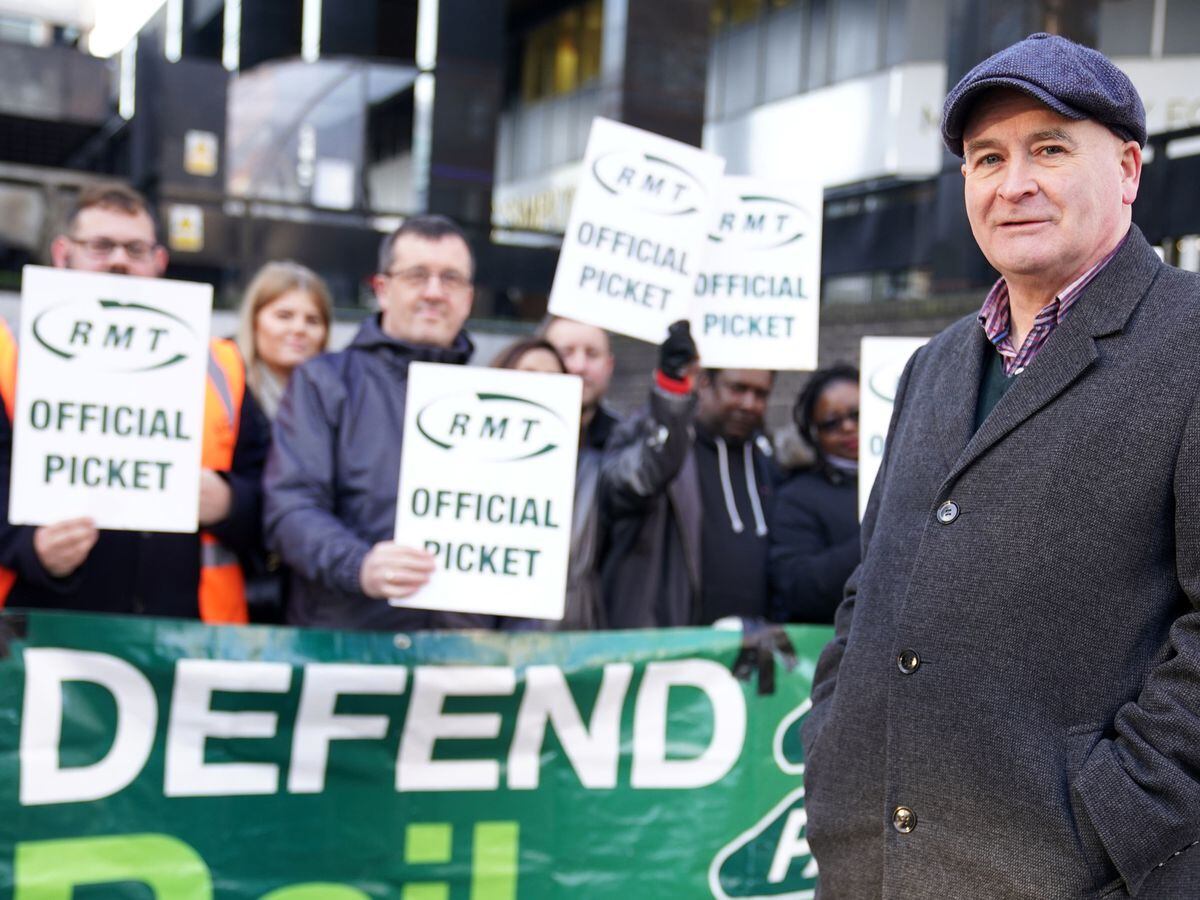 Mick Lynch, general secretary of the Rail, Maritime and Transport union (RMT), joins union members on the picket line outside Euston station in London during a rail strike in a long-running dispute over jobs and pensions. Photo: Kirsty O'Connor/PA Wire