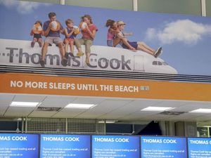 Empty Thomas Cook check-in desks at Gatwick Airport