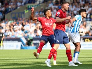 HUDDERSFIELD, ENGLAND - AUGUST 27: Grady Diangana of West Bromwich Albion reacts as he watches his shot go wide of the post after clipping a player in the box during the Sky Bet Championship between Huddersfield Town and West Bromwich Albion at John Smith's Stadium on August 27, 2022 in Huddersfield, United Kingdom. (Photo by Adam Fradgley/West Bromwich Albion FC via Getty Images).