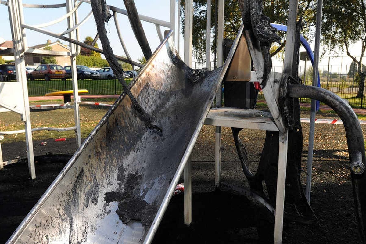 The burned slide and climbing frame in the playground off Pye Green Road, Cannock
