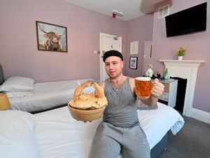 Regular customer Morgan Dunn enjoys a pie and pint in one of the new rooms
