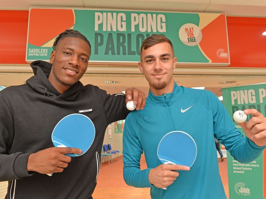 Timmy Abraham and Taylor Allen visit the ping pong parlour in the Saddlers Centre 