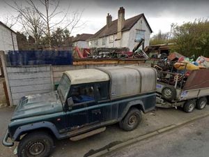 Scrap piled up at a property in Green Rock Lane in Bloxwich. Photo: Google Street View