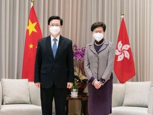 John Lee and Carrie Lam