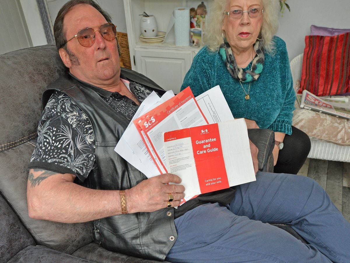  Brian and Beryl Faichuk, from Wednesfield, with the sofa which has now repaired