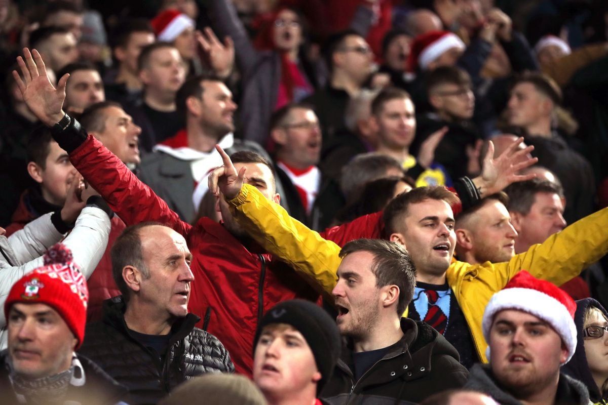 Southampton fans celebrate their win after the Premier League match at Villa Park (Nick Potts/PA Wire)