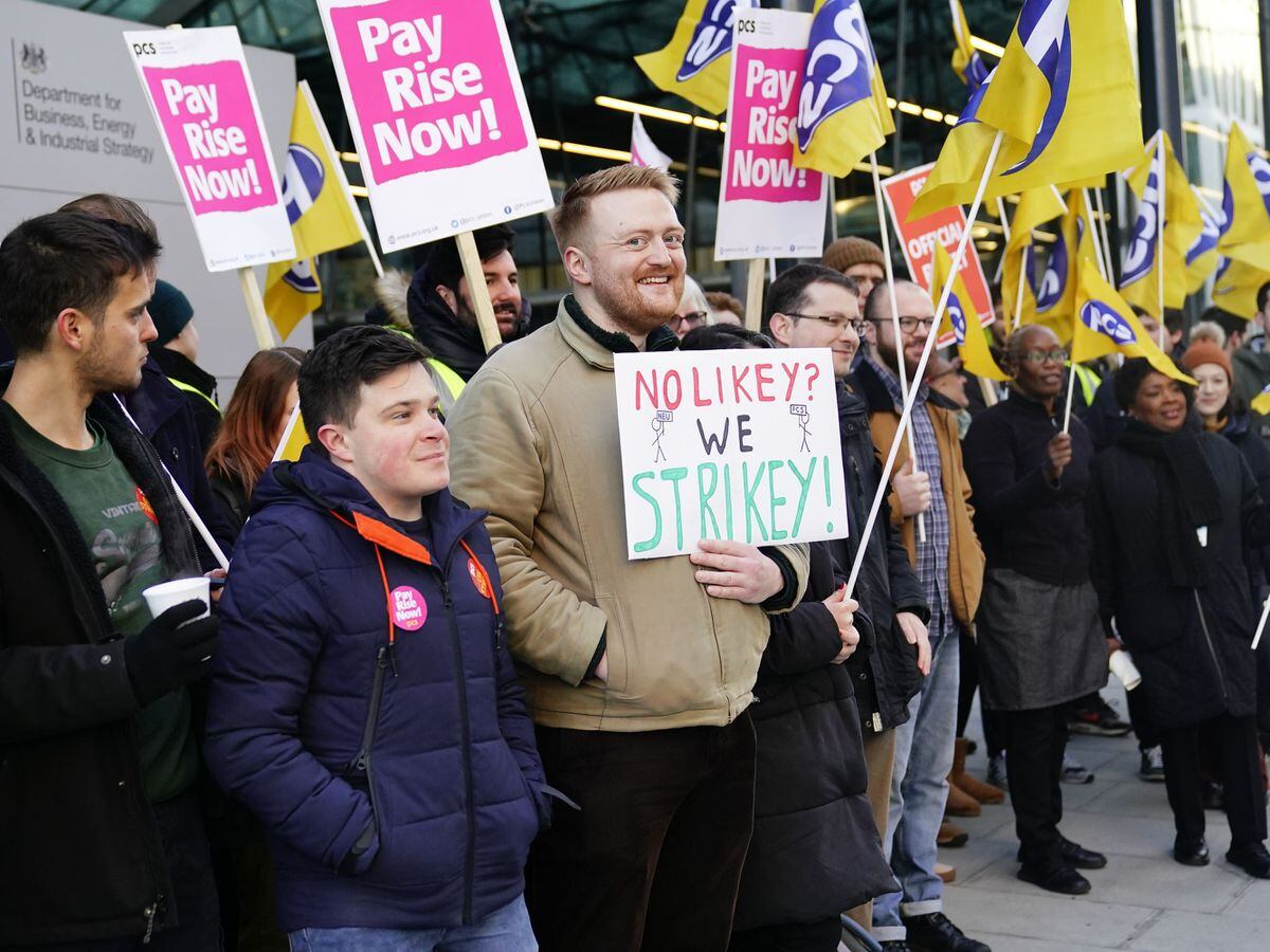 Members of the Public and Commercial Services union on the picket line outside the Department for Business, Energy and Industrial Strategy in Westminster