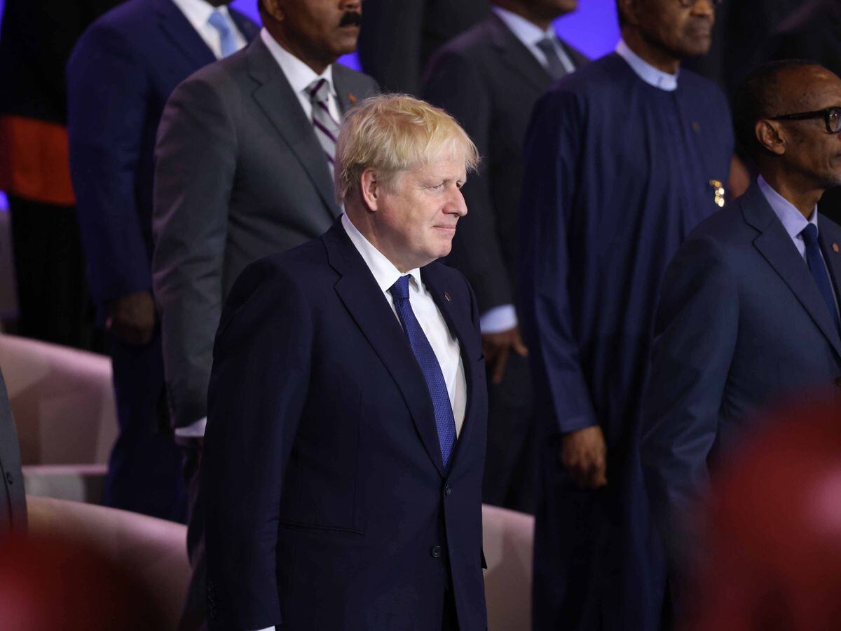 Prime Minister Boris Johnson arrives to attend the opening ceremony of the Commonwealth Heads of Government Meeting (CHOGM), during the royal visit to Rwanda on the day after he suffered two significant by-election defeats