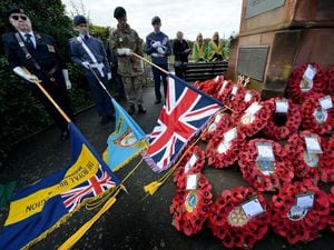 Standards are lowered during Bridgnorth's Remembrance Sunday service