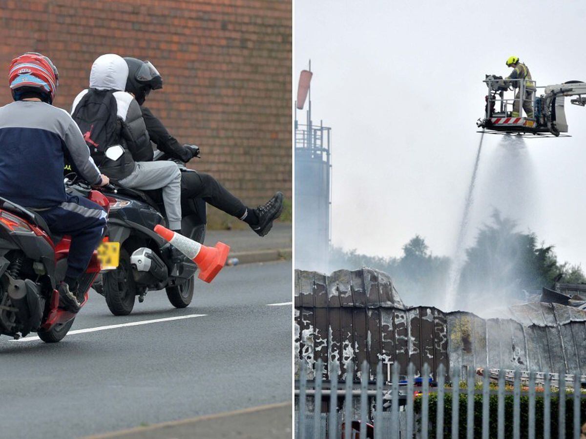 Firefighters at the scene of the blaze at the David Wood Foods bakery processing plant in Dudley - as youths on motorbikes ignore a roadblock near the scene