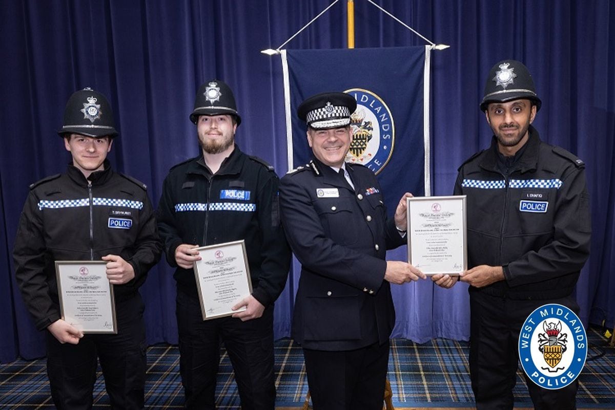 PCs Dryhurst, Hegarty and Shafiq are presented with their award