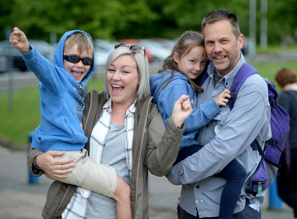 Walking For Health challenge starting from WV Active, Aldersley. Stacey and Robert Roalfe with twins George and Willow, aged 6. 
