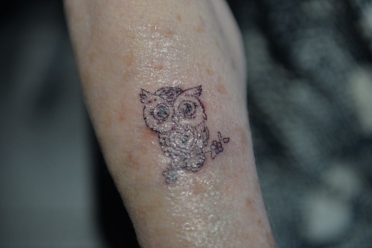 Joan's new tattoo: an owl.