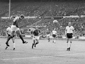 England’s Geoff Hurst (second left) heads the equaliser in the 1966 World Cup final