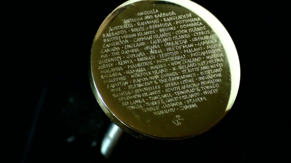Graham Short has engraved the names of all 72 competing nations at the Commonwealth Games on the head of a gold pin measuring 2mm wide 
